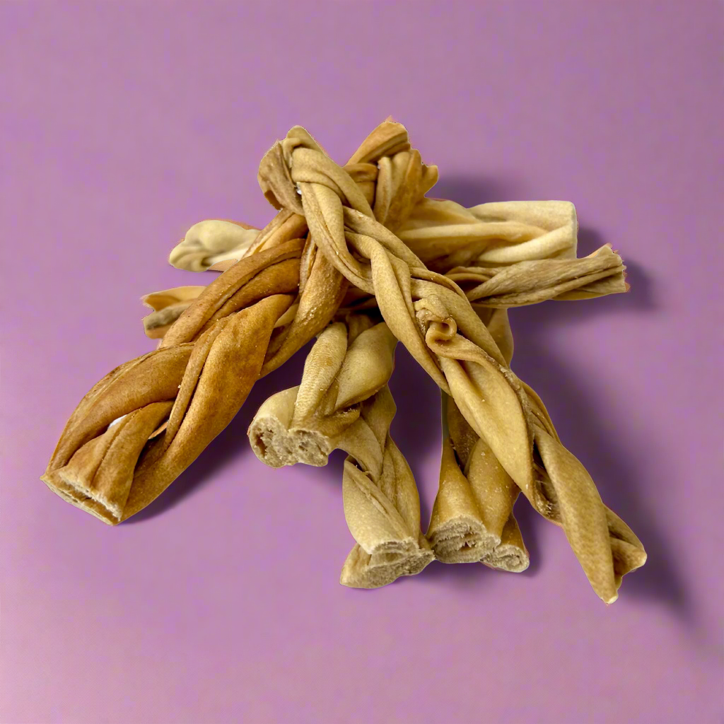 Plaited lengths of dried lamb skin, laid flat