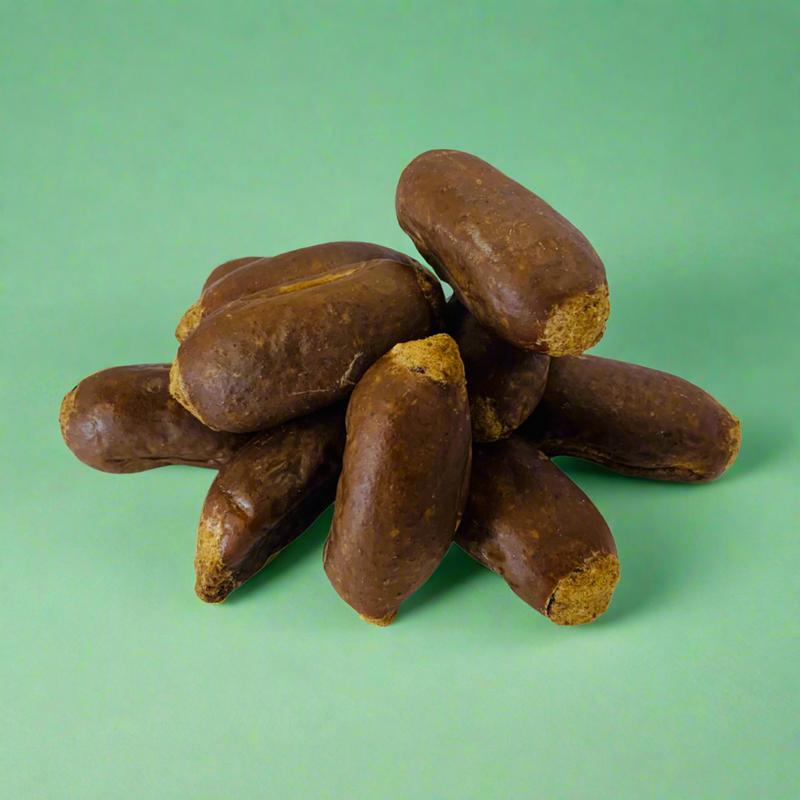 Small duck sausages for dogs, laid flat