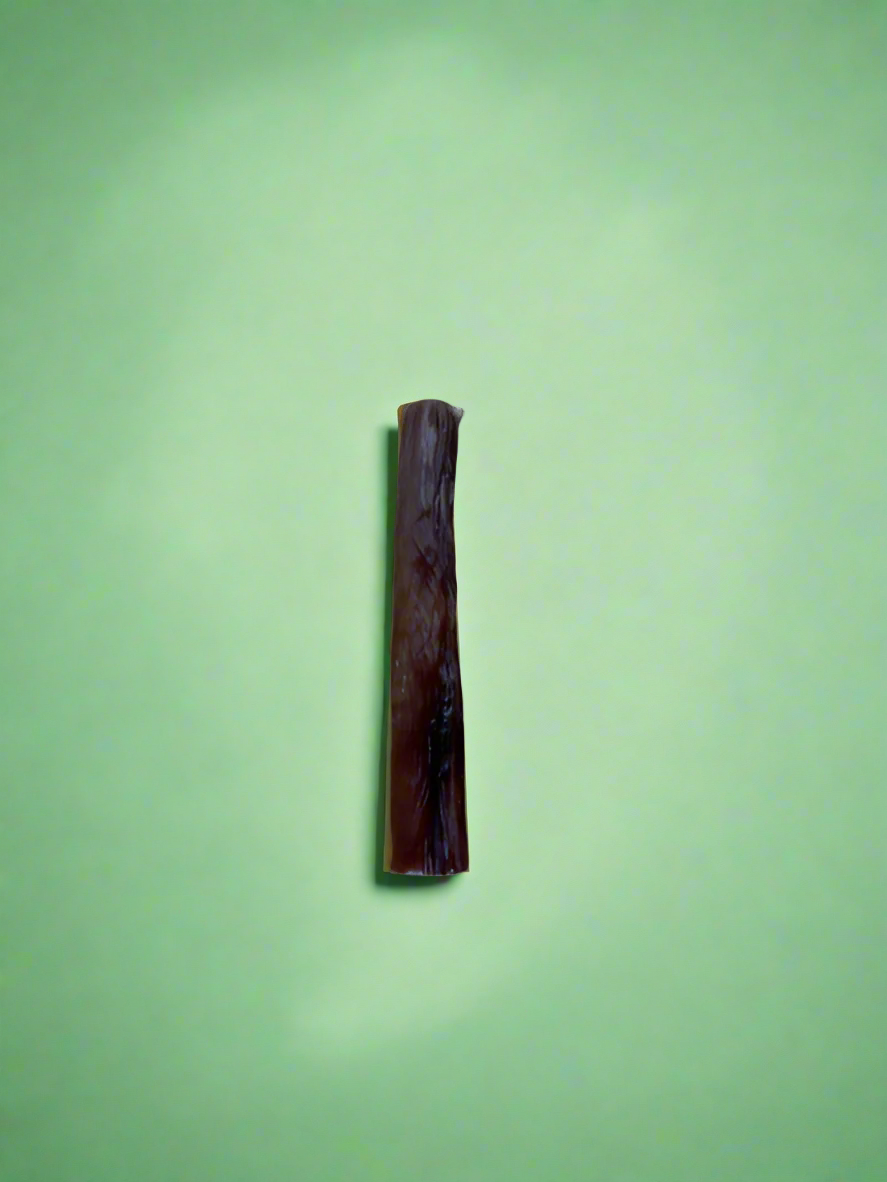 Straight dried beef pizzle sticks, laid flat