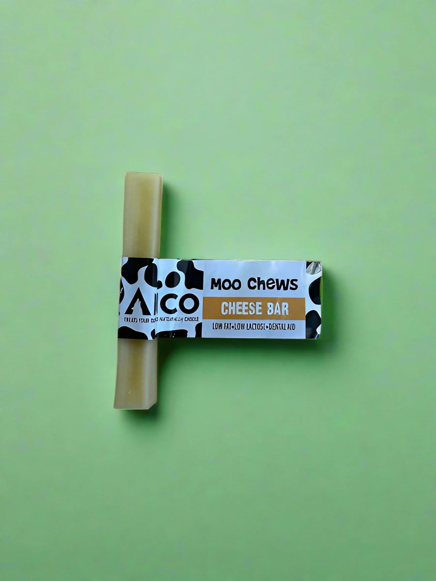 A medium pale block of hard pressed yak milk chew, laid flat