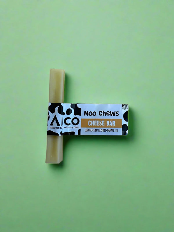 A medium pale block of hard pressed yak milk chew, laid flat