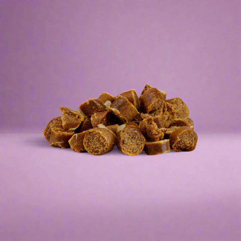 Small chicken and cheese nibbles for dogs, laid flat