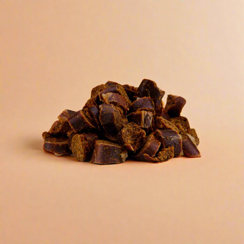 Small duck nibbles for dogs, laid flat
