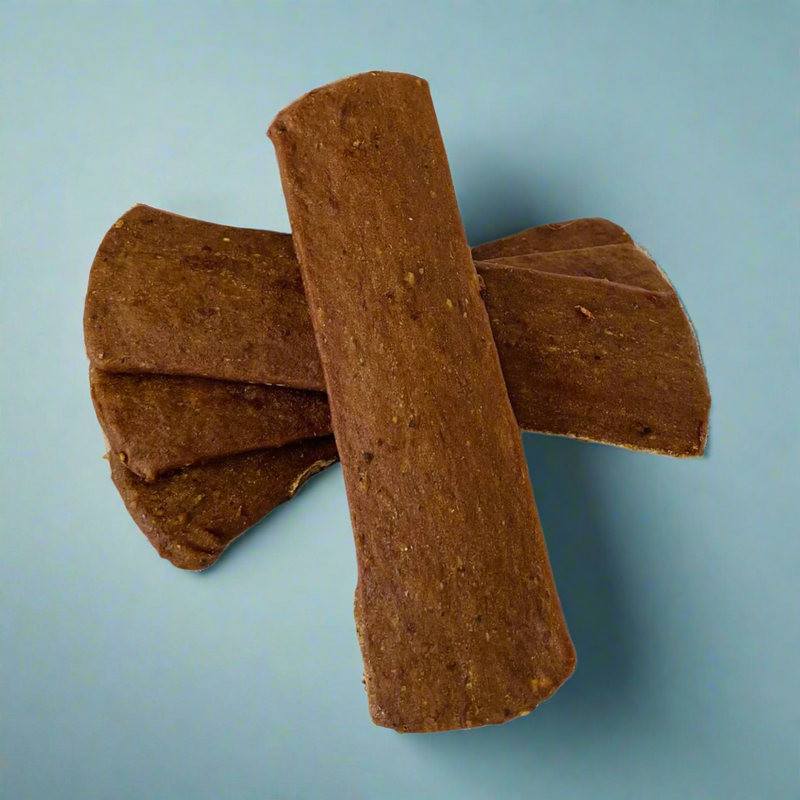 Strips of dried duck for dogs, laid flat