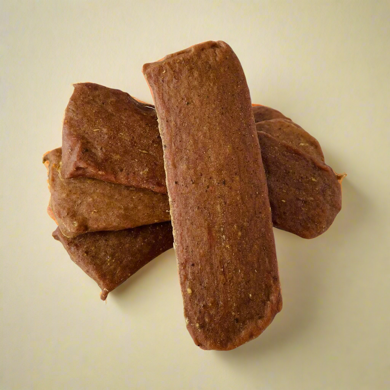 Strips of dried turkey for dogs, laid flat