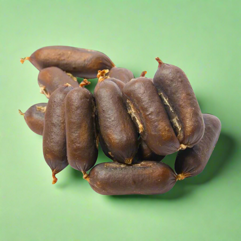 Small beef liver and chicken sausages for dogs, laid flat