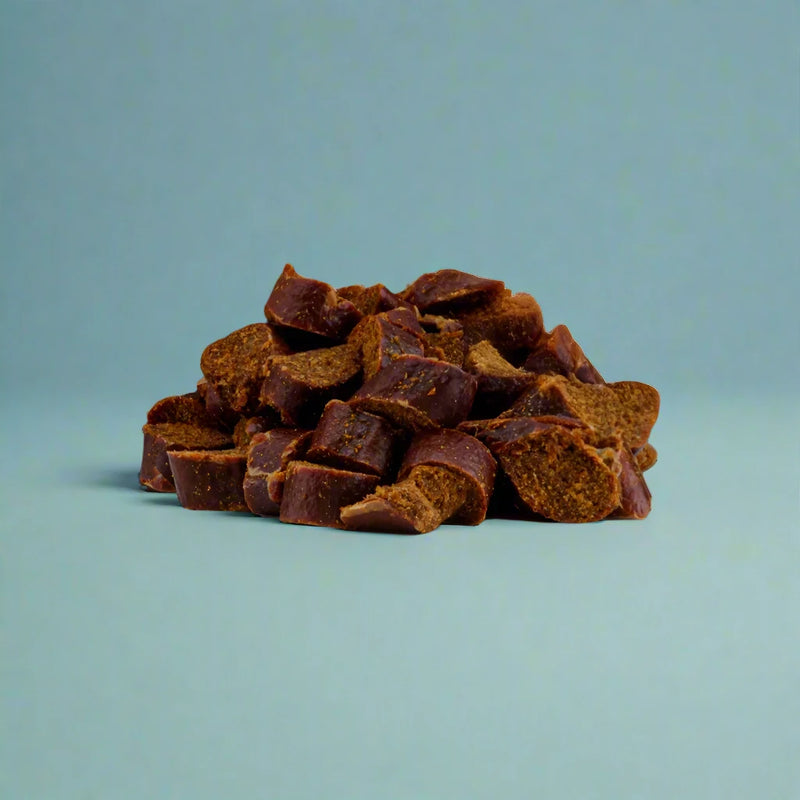 Small beef liver and chicken nibbles for dogs, laid flat