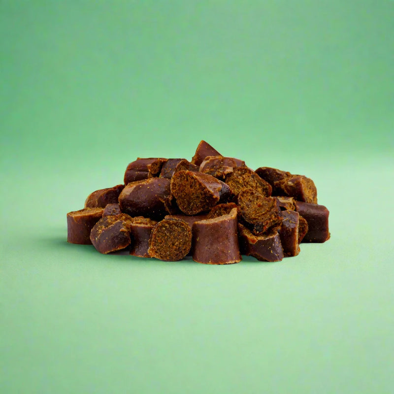 Small beef and vegetables nibbles for dogs, laid flat