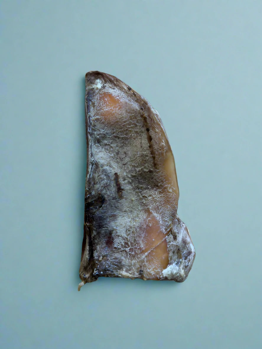 Crescent shaped slices of beef shoulder blade, laid flat