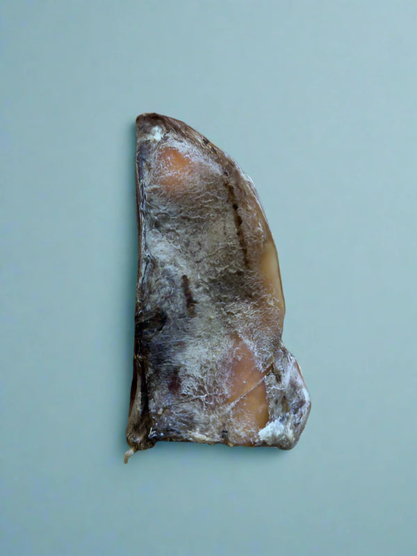 Crescent shaped slices of beef shoulder blade, laid flat
